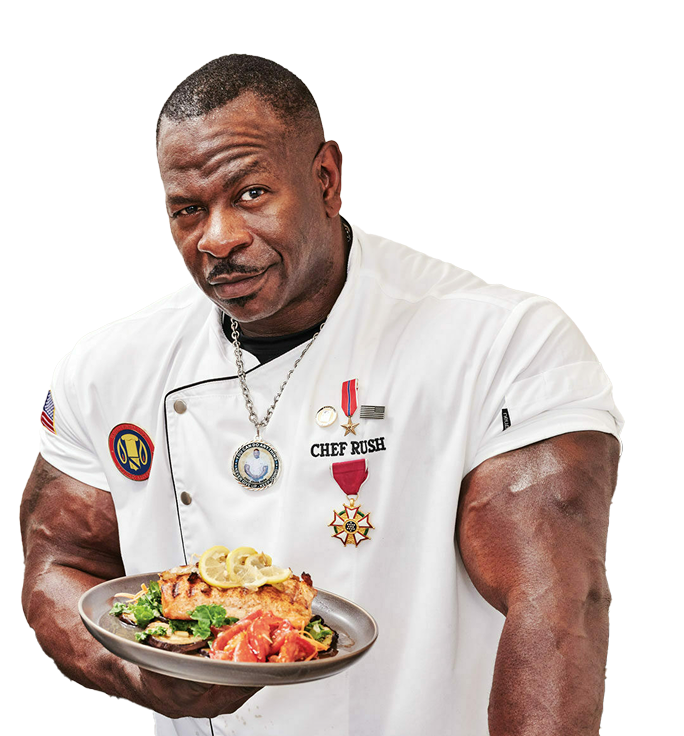 Chef Rush presenting a plated dish